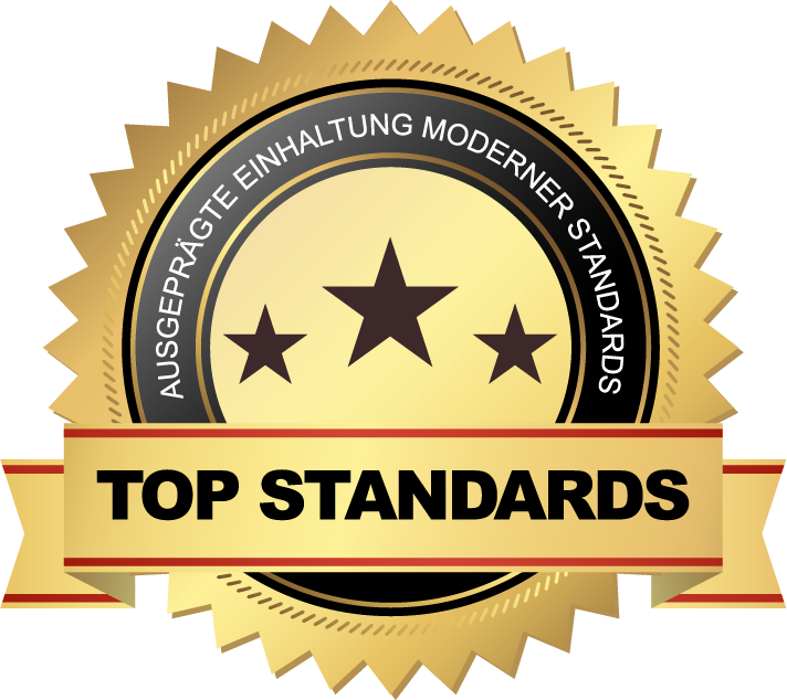 Goldenes Qualitätssiegel mit Sternen und dem Schriftzug „Top Standards – ausgeprägte Einhaltung moderner Standards“.